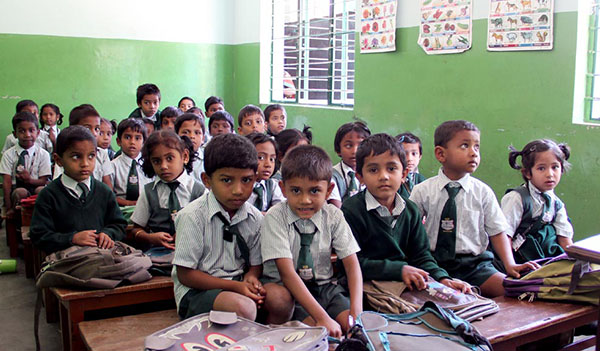 Foster mom opens private school in India