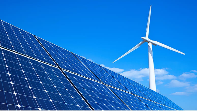 Blue sky solar panels and wind mill