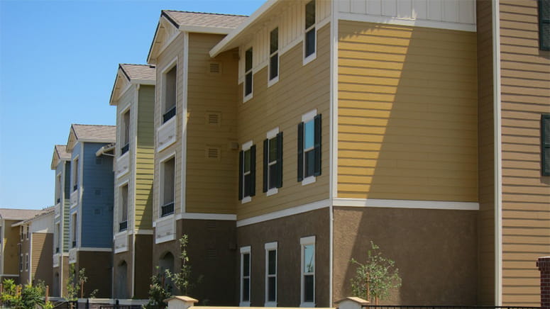 Three story apartment building