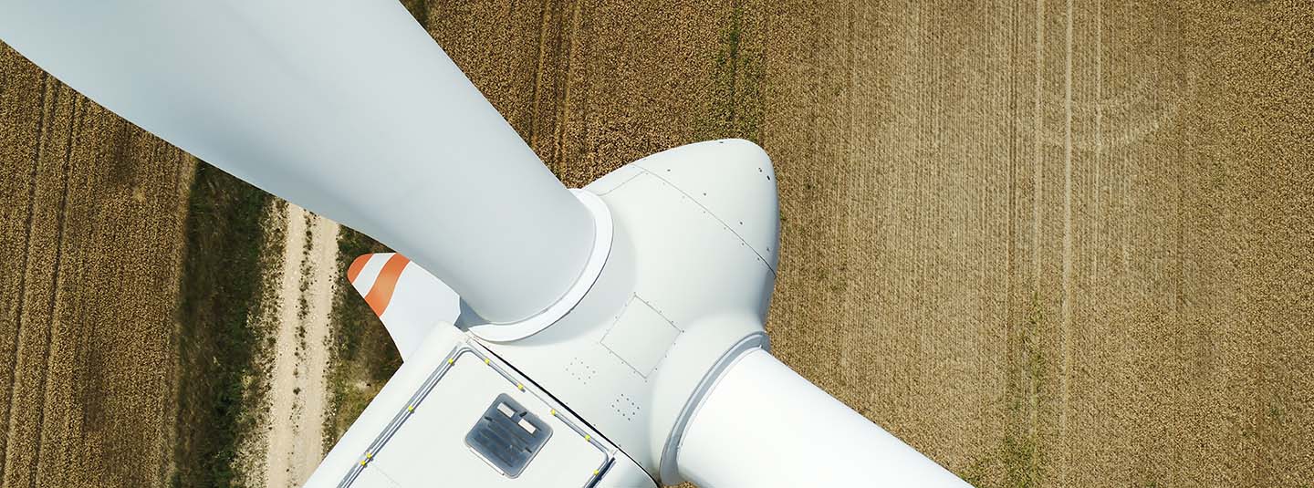 Aerial closeup view of wind turbine